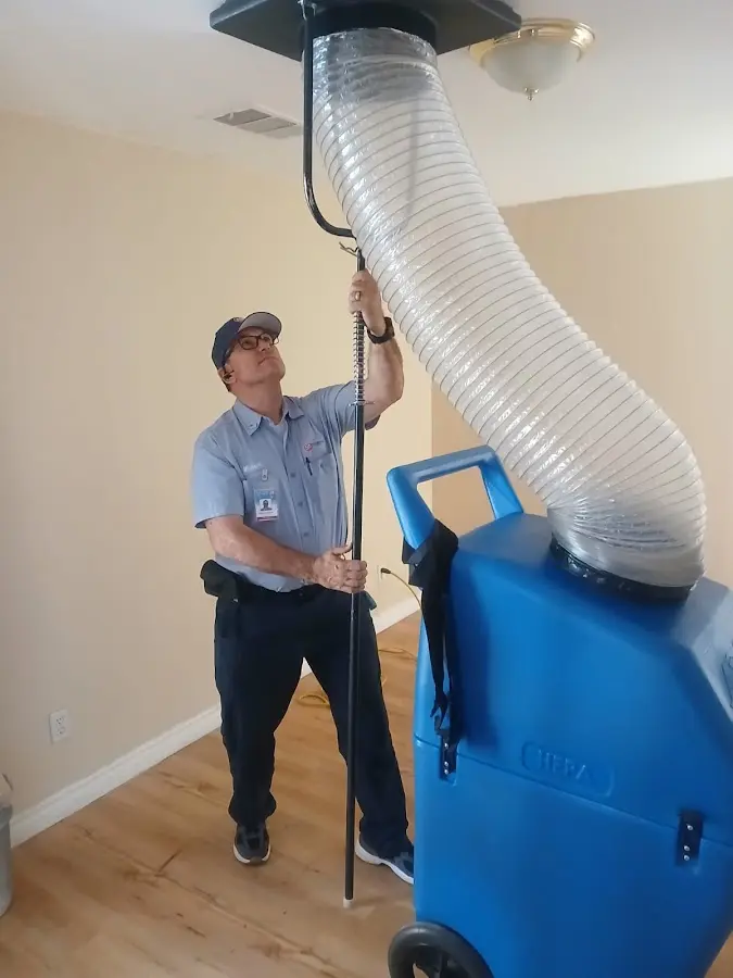 Furnace Tune-Up technician using HEPA equipment in Wichita Falls
